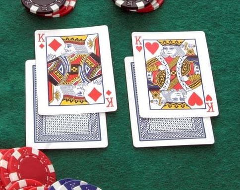 Blackjack cards illustrating MONOPOLY Blackjack Progressive expansion